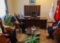 Numan Kurtulmuş Hemserekanê Pêroyî yê DEM Partî reyde kom bi