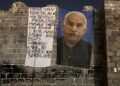 Wêneyê Abdullah Ocalan li ser sûrên Amedê hat daliqandin